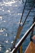Photo: rigging of sail ship and sea waves with the sun specks rigging of sail ship and sea waves with the sun specks