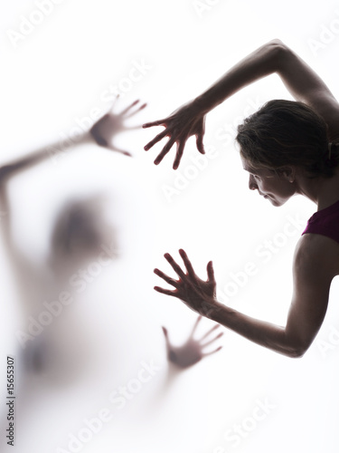Photo: Two people reaching out to each other Two people reaching out to each other