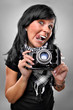 Photo: Frau mit Kamera Frau mit Kamera