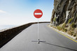 A single street sign on a desolate road