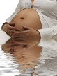 Foto: Embarazada reflejada. Embarazada reflejada.