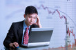 Photo: Financial Crisis - Asian Businessman Mulls Over Future Financial Crisis - Asian Businessman Mulls Over Future