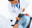 Team of doctors discussion over an x-ray scan