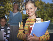 Students outside of school with the teacher