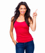 Happy young girl in red top standing against isolated white