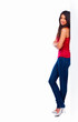 Full length of a young girl isolated on white background