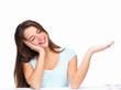 Young beautiful woman gesturing hands with eyes closed