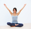 Pretty smiling young girl exercising isolated on white backgroun