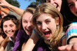 teenage fans screaming and reaching out for a celebrity
