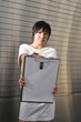 Young Asian Woman With Clipboard