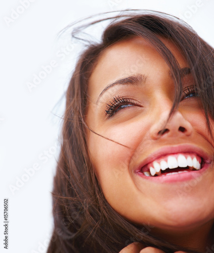 Photo: Closeup of a laughing young girl Closeup of a laughing young girl