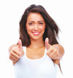 Closeup of a smiling young teen girl showing thumbs up sign isol