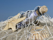 Bottle with message in the fishing net