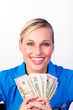 Businesswoman holding money in her hands