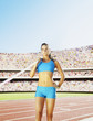 Athlete pole vaulting in an arena