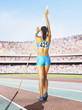 Athlete pole vaulting in an arena