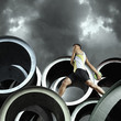 Discus thrower on large cylinders