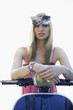 Woman sitting on a scooter after a party