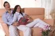 Young couple having fun on the couch