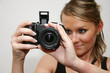 Foto: cute girl with digital camera cute girl with digital camera