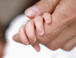 Holding hands with daddy