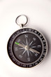 Compass on plain background
