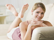 Woman Lying on Couch