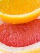 Fresh grapefruit and orange - organic background