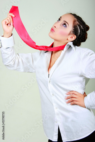 Photo: glamour businesswoman with red tie glamour businesswoman with red tie