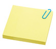 yellow pages of notebook with paper clip on white