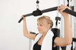 Young blond woman workout in gym