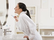 Woman Brushing Teeth