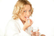 Photo: Portrait of young smiling woman with pill Portrait of young smiling woman with pill