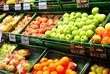 Photo: various fruits in the supermarket on shelves various fruits in the supermarket on shelves