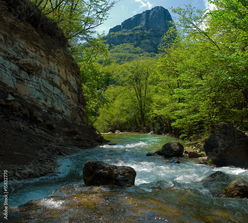 Photo: Rapid mountain river in the Crimean canyon Rapid mountain river in the Crimean canyon