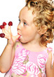 girl enjoying  raspberry