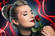 Charming lady with red rose