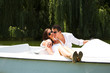 Young attractive couple on boat