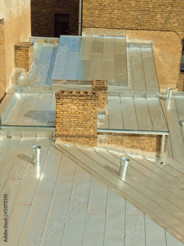 Foto: Tin roof and chimneys Tin roof and chimneys