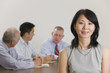 Photo: Portrait of businesswoman and her team. Portrait of businesswoman and her team.
