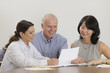 Photo: Business meeting over documents. Business meeting over documents.