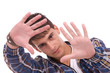 Young man showing framing hand gesture