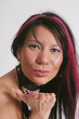 Pretty woman blowing a kiss