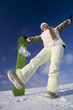 Photo: Happy girl with snowboard at sunny day at winter Happy girl with snowboard at sunny day at winter