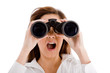 portrait of shocked woman looking through binocular portrait of shocked woman looking through binocular