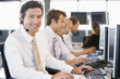 Stock Traders Working At Computers