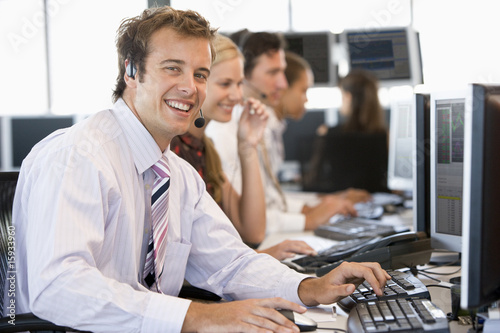 Photo: Stock Trader Smiling At Camera Stock Trader Smiling At Camera