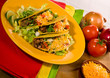 A plate of freshly prepared beef tacos A plate of freshly prepared beef tacos