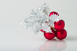 Christmas decoration, silver branch and red balls Christmas decoration, silver branch and red balls