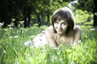 Young smiling girl in grass